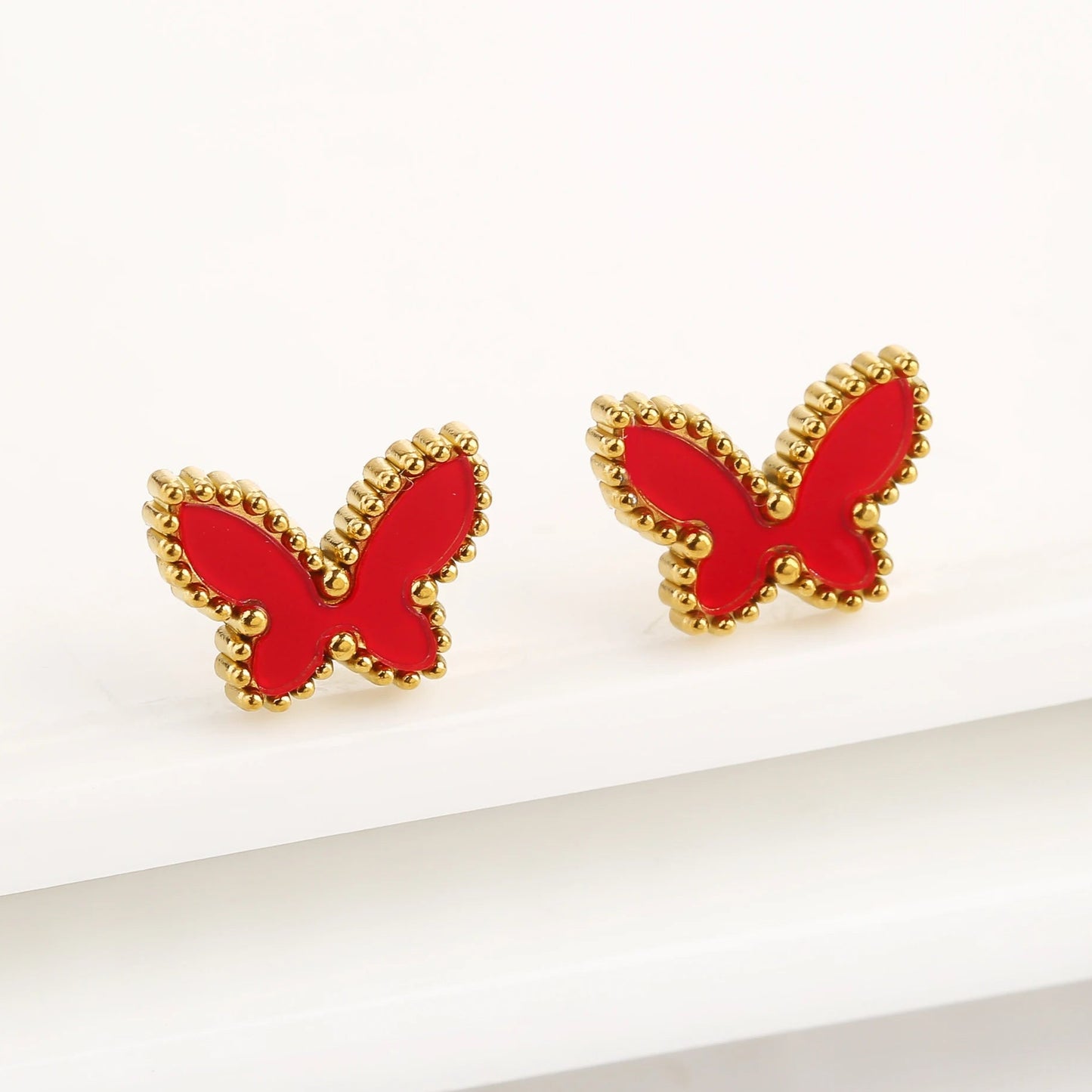Boucle d'oreille Papillon